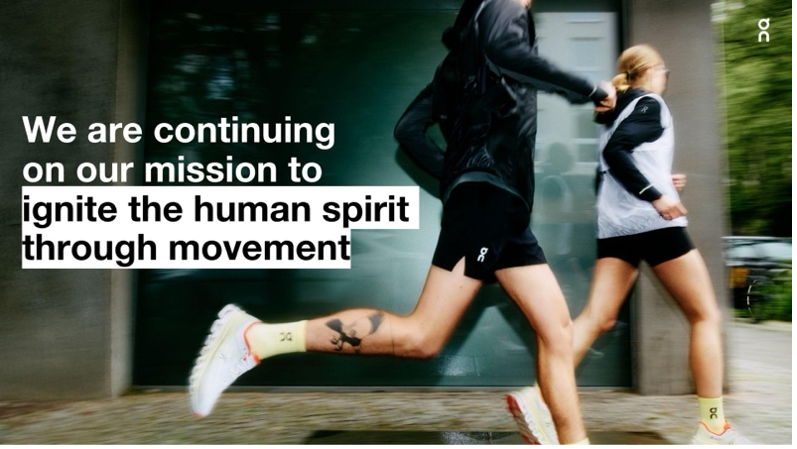 Two people running through an urban environment