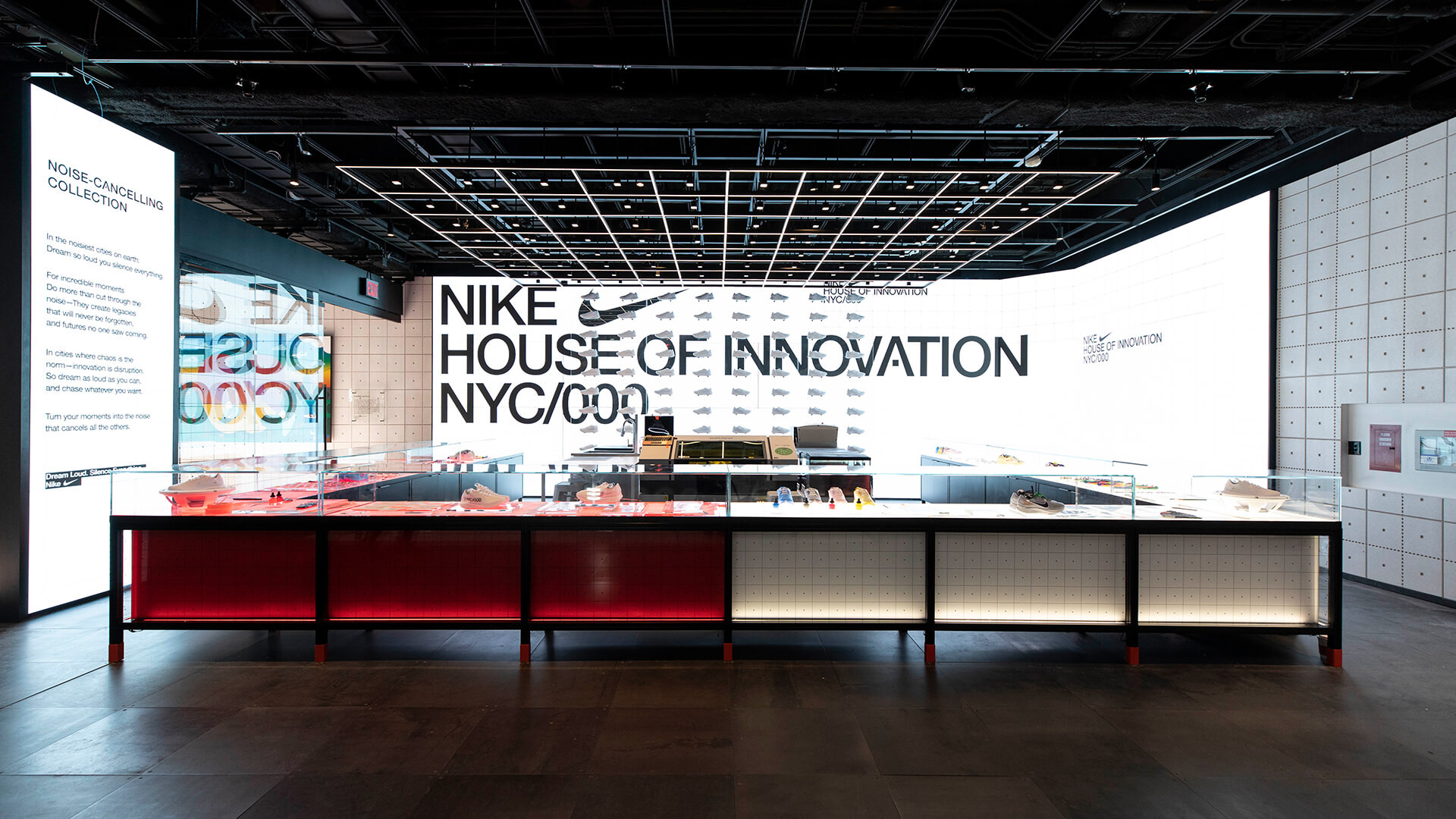 Interior of Nike’s House of Innovation NYC, showcasing the Noise-Cancelling Collection with modern, immersive retail design and sneaker prototypes on display.